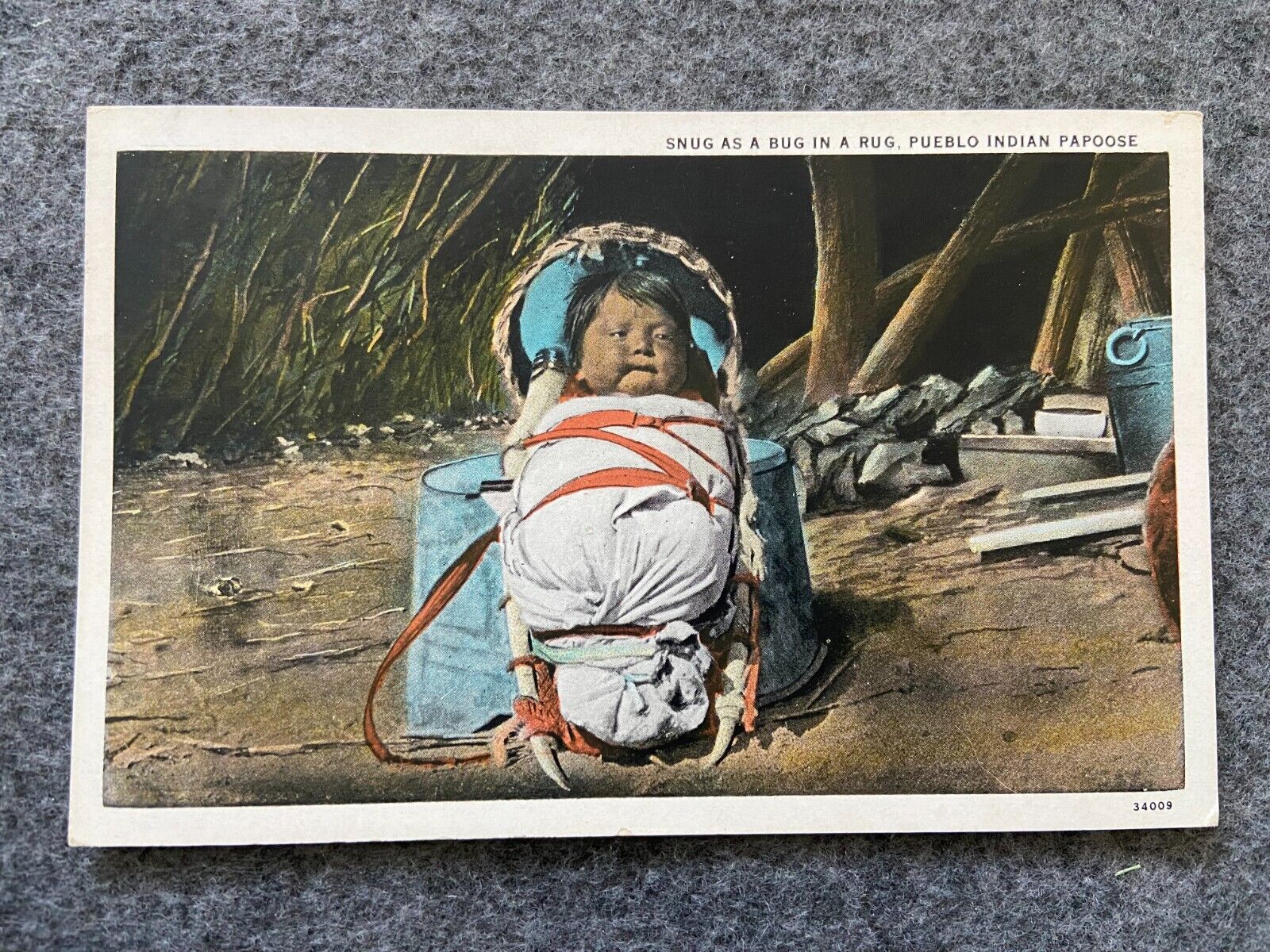 Snug as a bug in a rug, Pueblo Indian Papoose Vintage Postcard