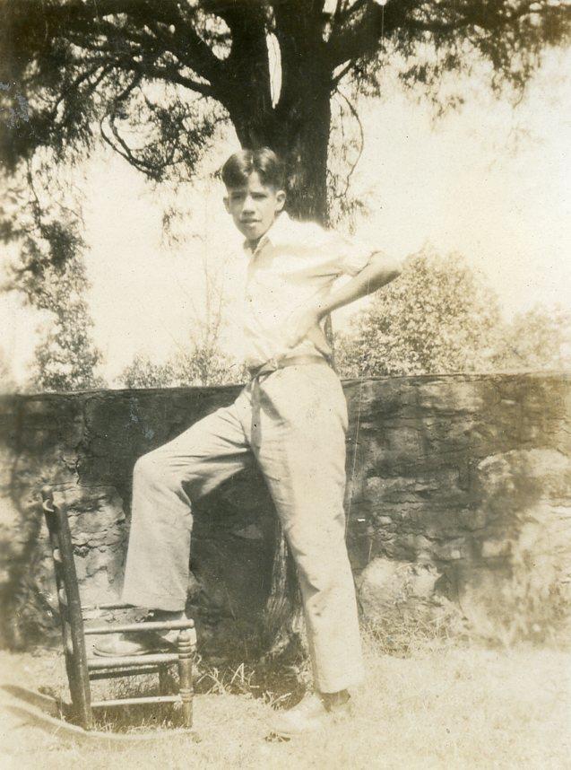 W339 Vtg Photo YOUNG MAN COMING OF AGE, FOOT ON BABY CHAIR c 1920\'s