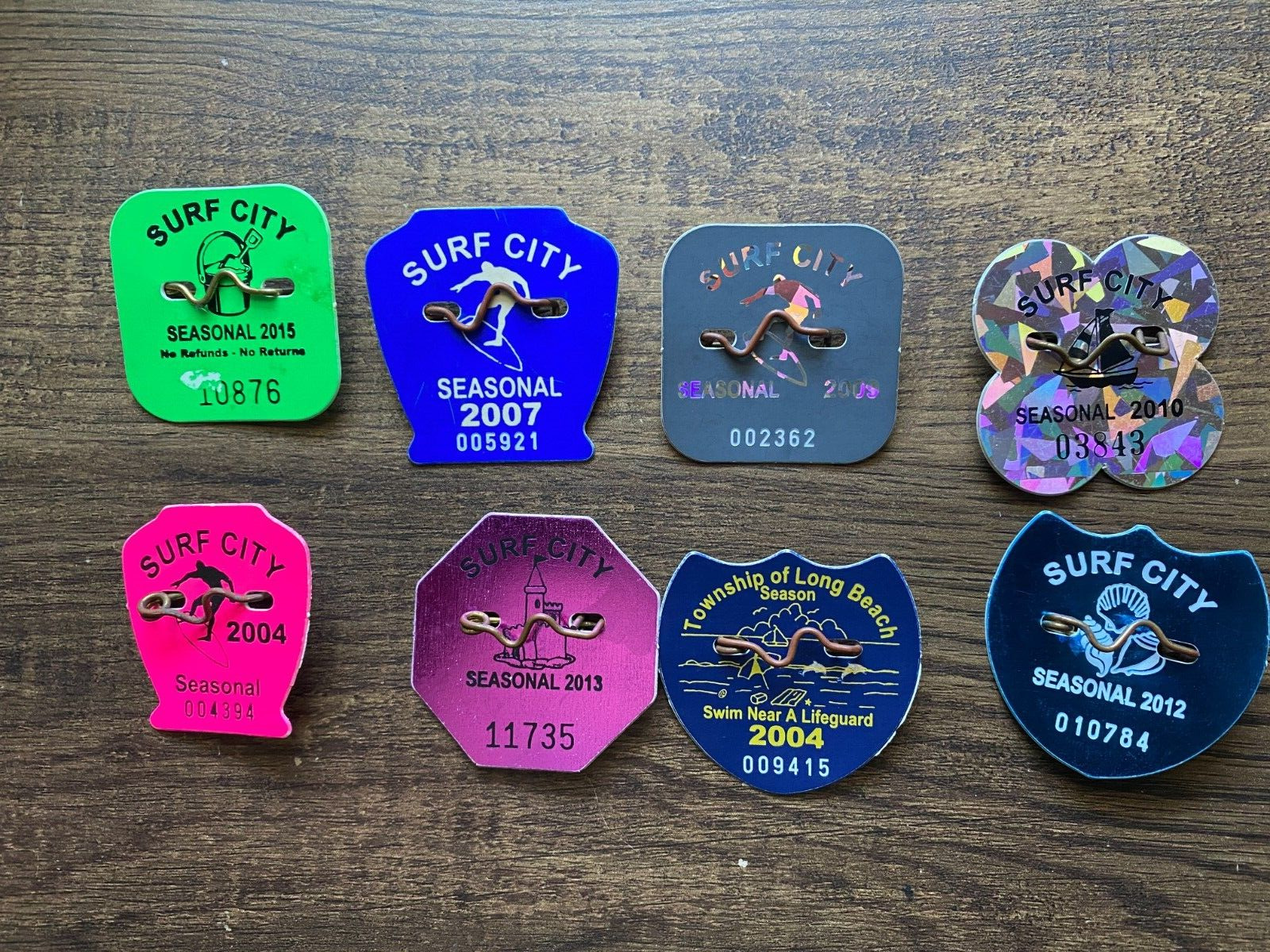 Surf City NJ Lot of 8 Beach badges | Long Beach Island | 2004-2015  Description