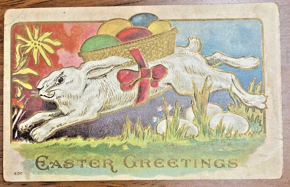 Vintage c1910 Easter Greetings Rabbit With Eggs Basket Flowers Embossed Postcard