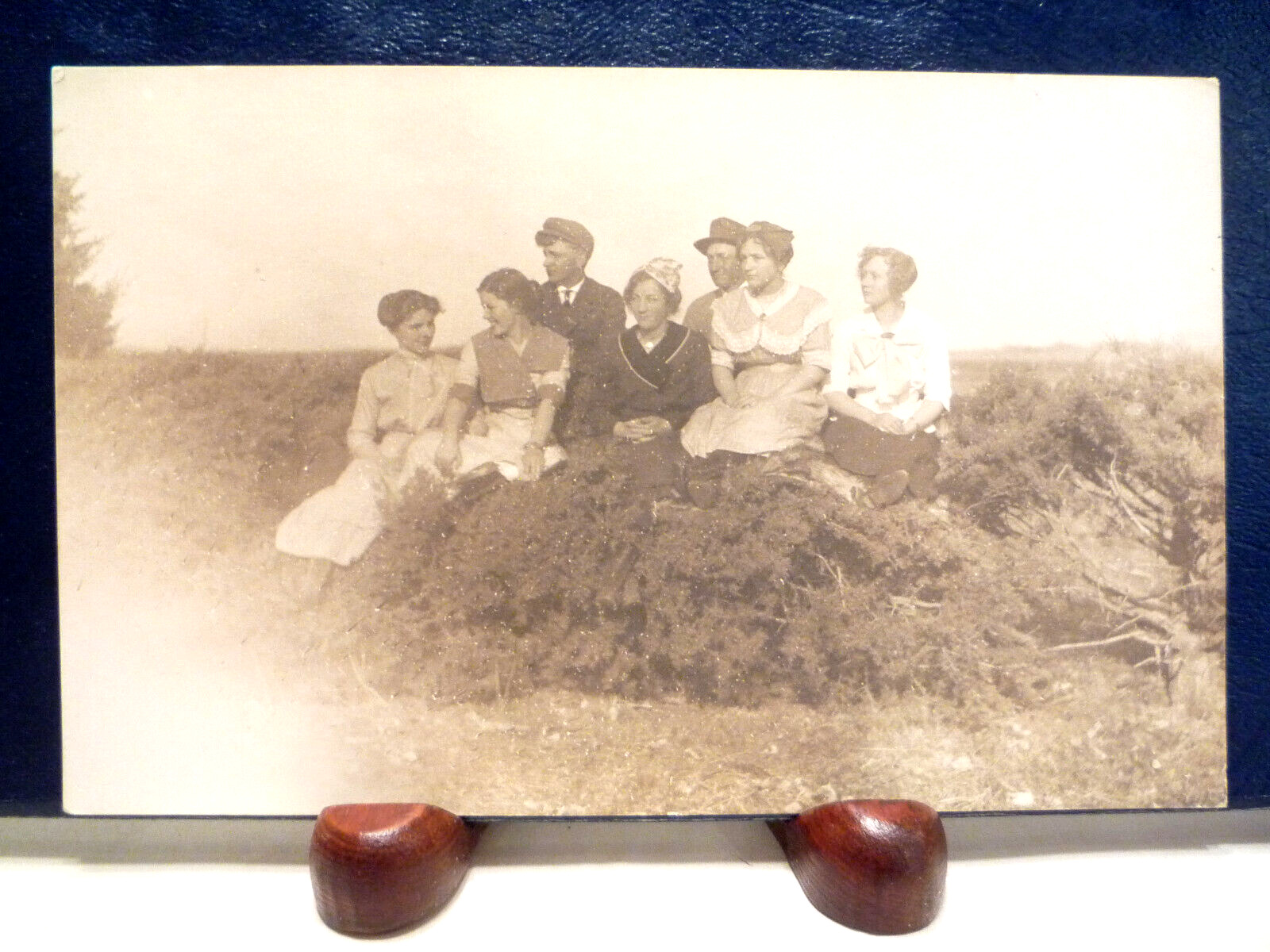 Antique 1904-1918 RPPC Women and Men sitting on something, Fashion, Group Photo