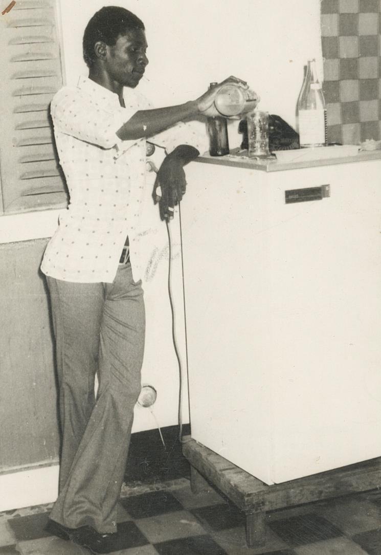 c. 1970's Young Man at Bar, Mali Photograph by Malick Sidibe STAMPED
