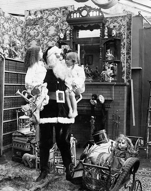 Santa Claus Is Depicted Unloading The Gifts As Two Of His Admirers S - Old Photo