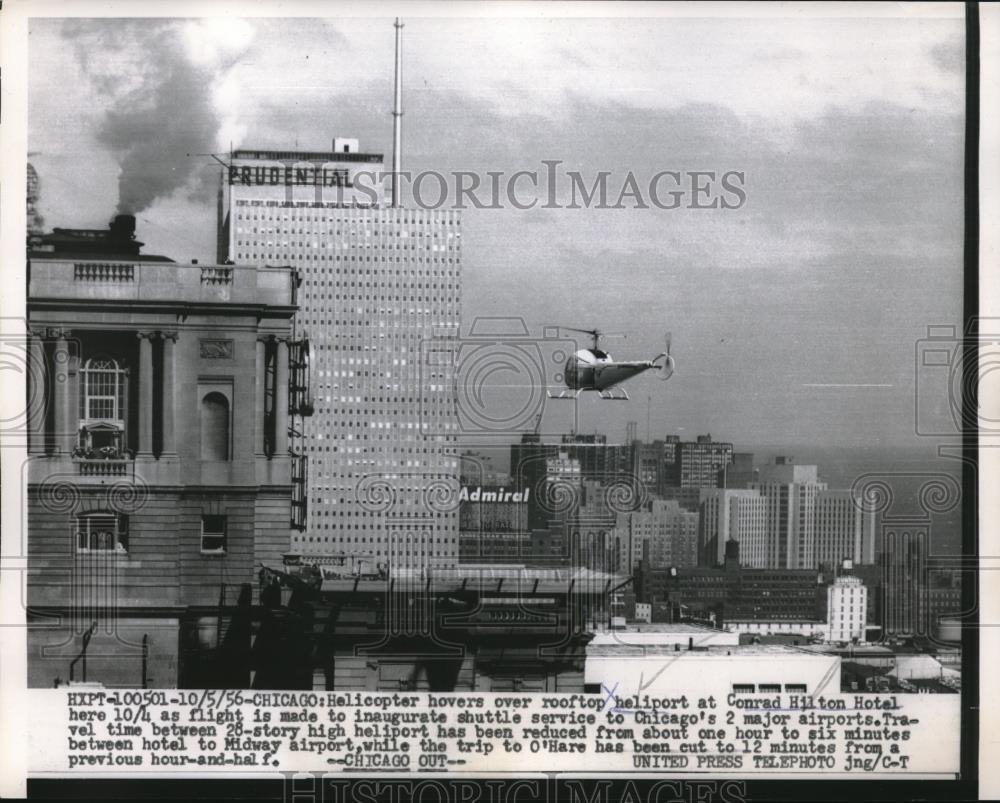 1956 Press Photo Helicopter Hovers Over Rooftop of Conrad Hilton Hotel