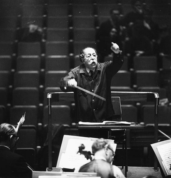 Conductor Pierre Monteux leading London Philharmonic Orchestra durin- Old Photo