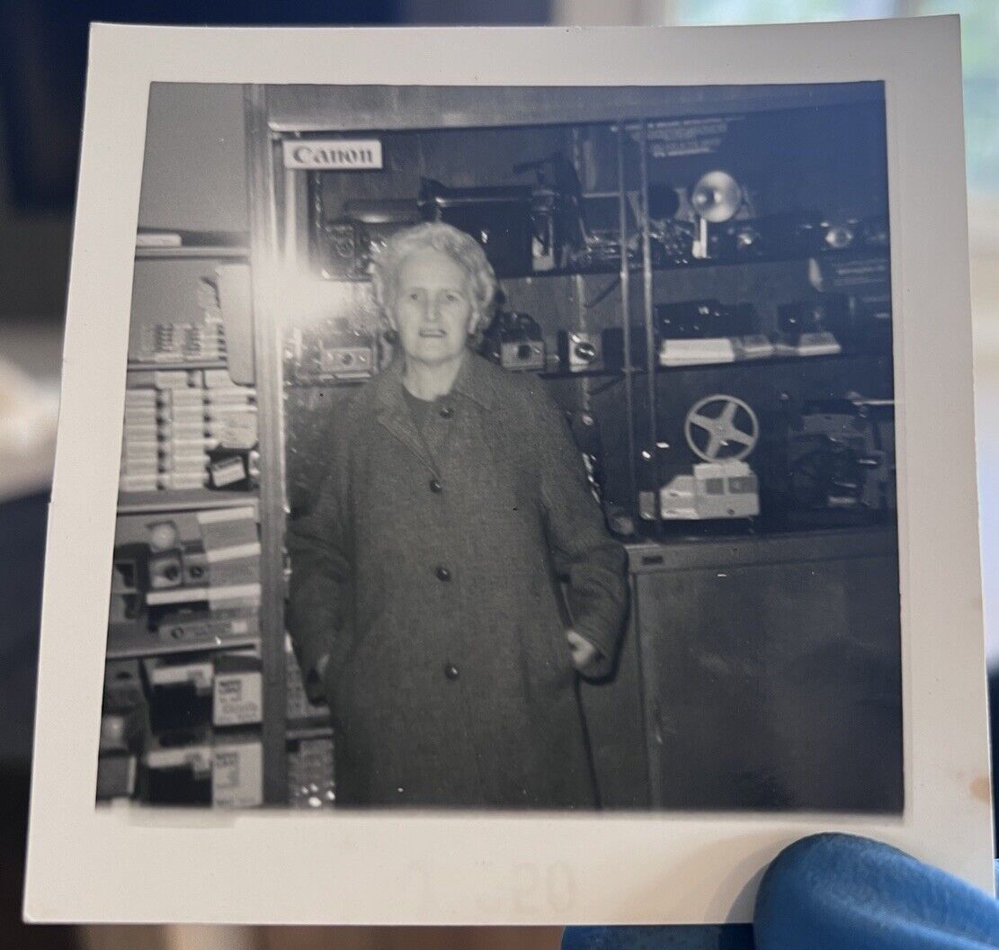 c1950 Elder Woman Old Lady In Canon Camera Store Film Shop Snapshot Snap Photo