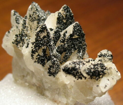 Preferential Babingtonite Crystal Deposit on Calcite Crystals