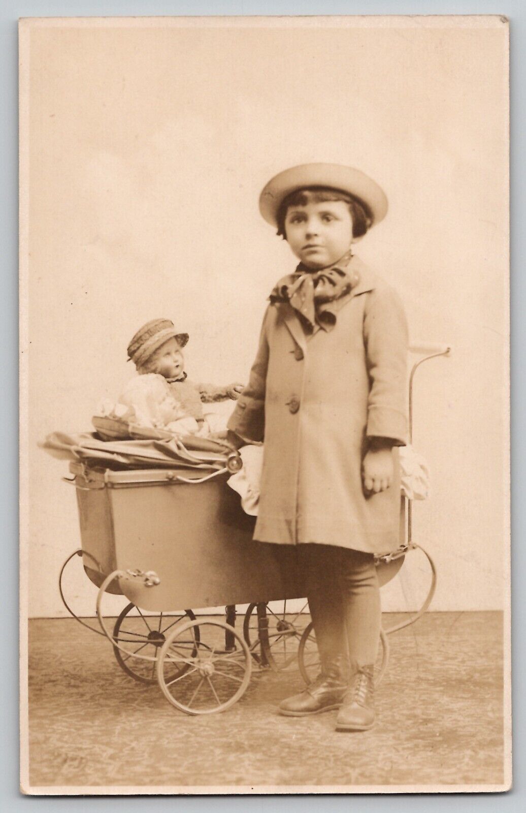 c 1920\'s RPPC Little Girl Hat Coat w Carriage Pram 2 Baby Dolls Studio Postcard
