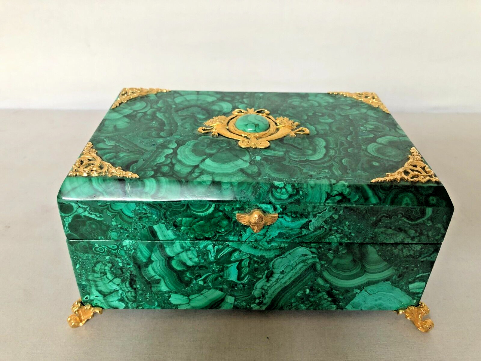 Solid Natural Hinged Malachite Box with Gilded Bronze Decoration.