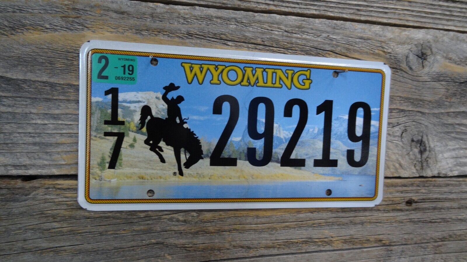 Wyoming Passenger new issue font license plate with bucking horse Wyoming plate