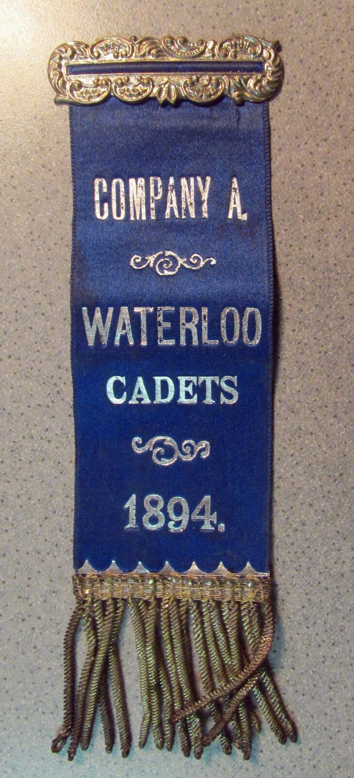 1894 WATERLOO COMPANY A CADETS RIBBON w/ ORIGINAL WHITEHEAD & HOAG TAG antique
