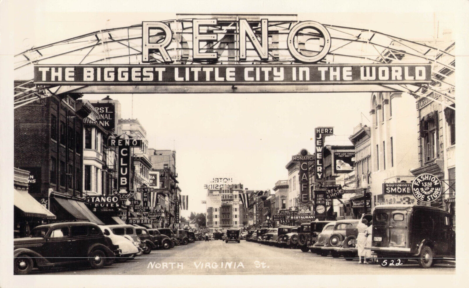 RPPC Reno Arch Main Street Scene c1930s Nevada Club Herz Jewelers Clock