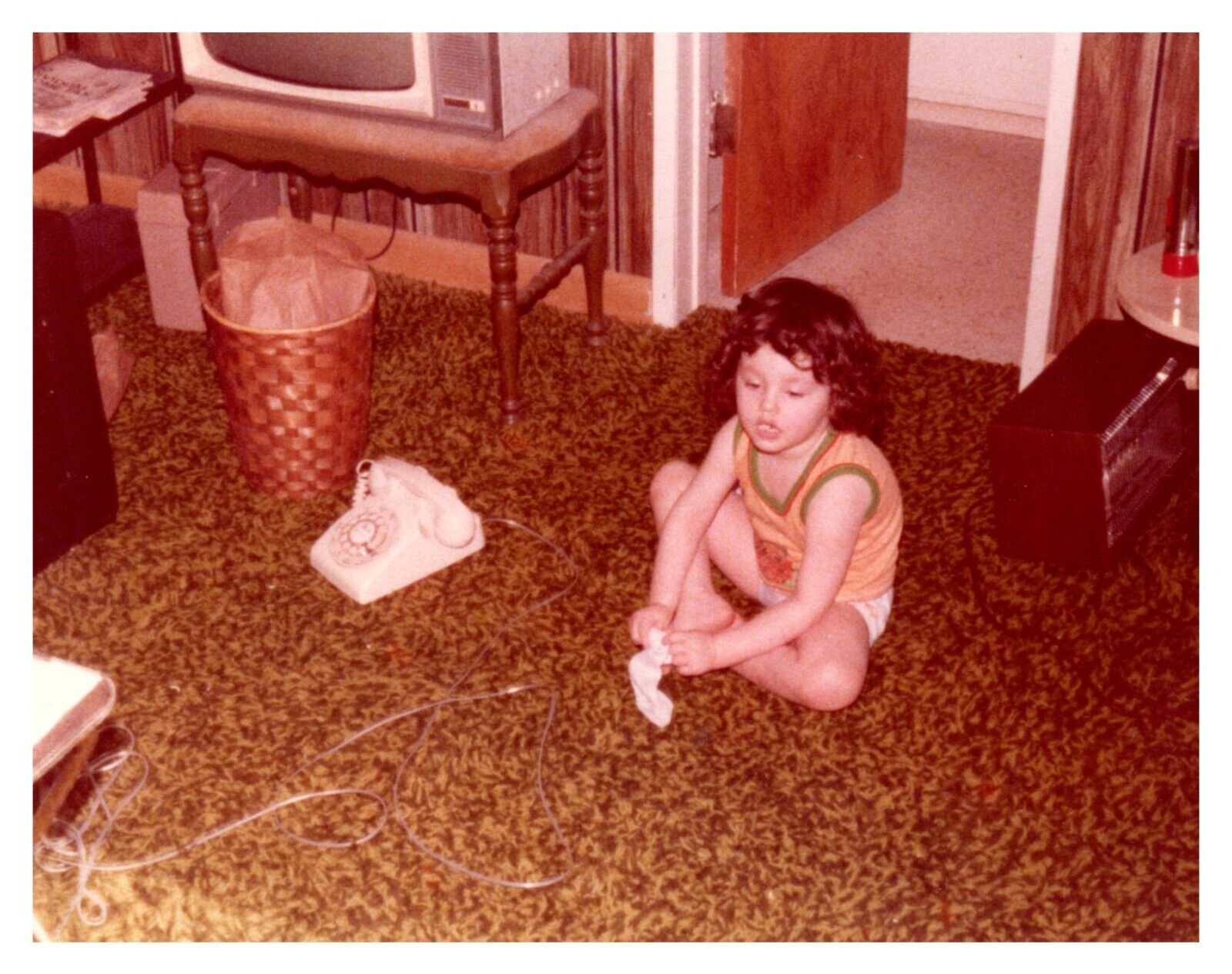 1970s Little Girl Putting on Socks Los Angeles Vintage Photo