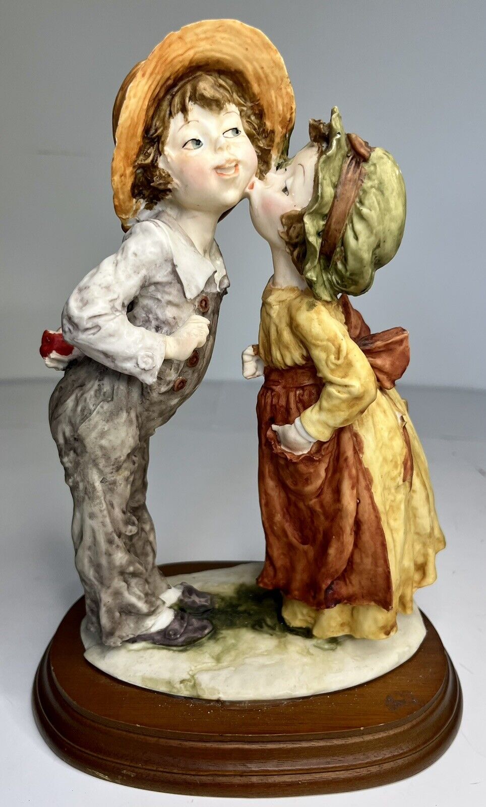 Italian Capodimonte - Giuseppe Armani Girl And Boy Sharing Kiss Statue
