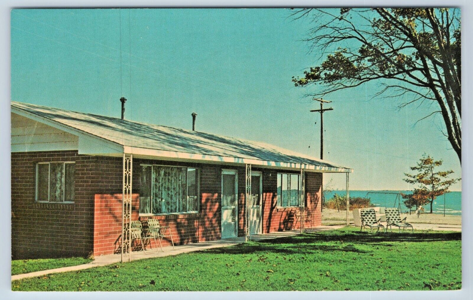 Postcard Dimmicks Colonial Cottages East Tawas Michigan Motel 1964