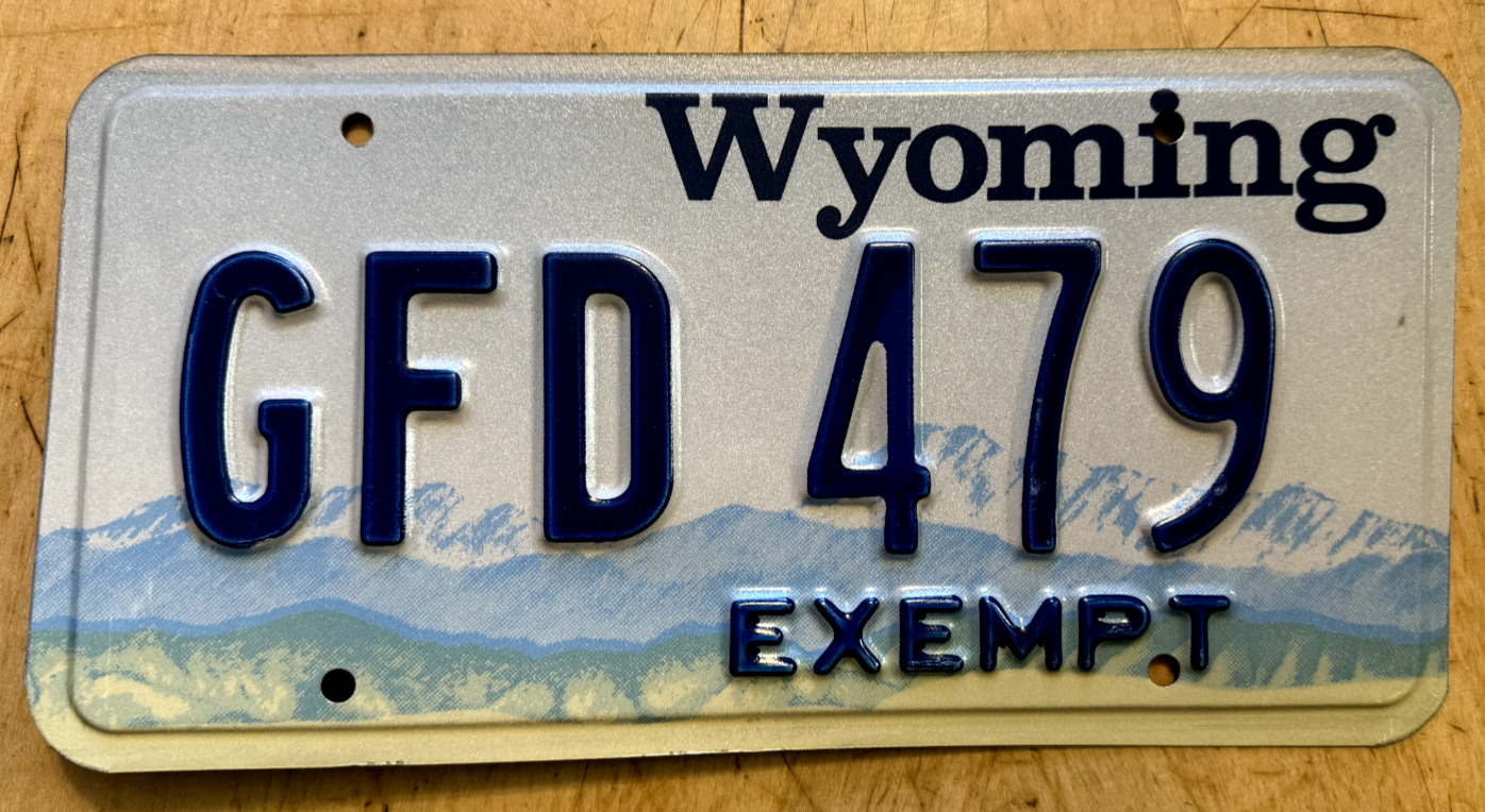 MINT WYOMING GRAPHIC EXEMPT LICENSE PLATE \