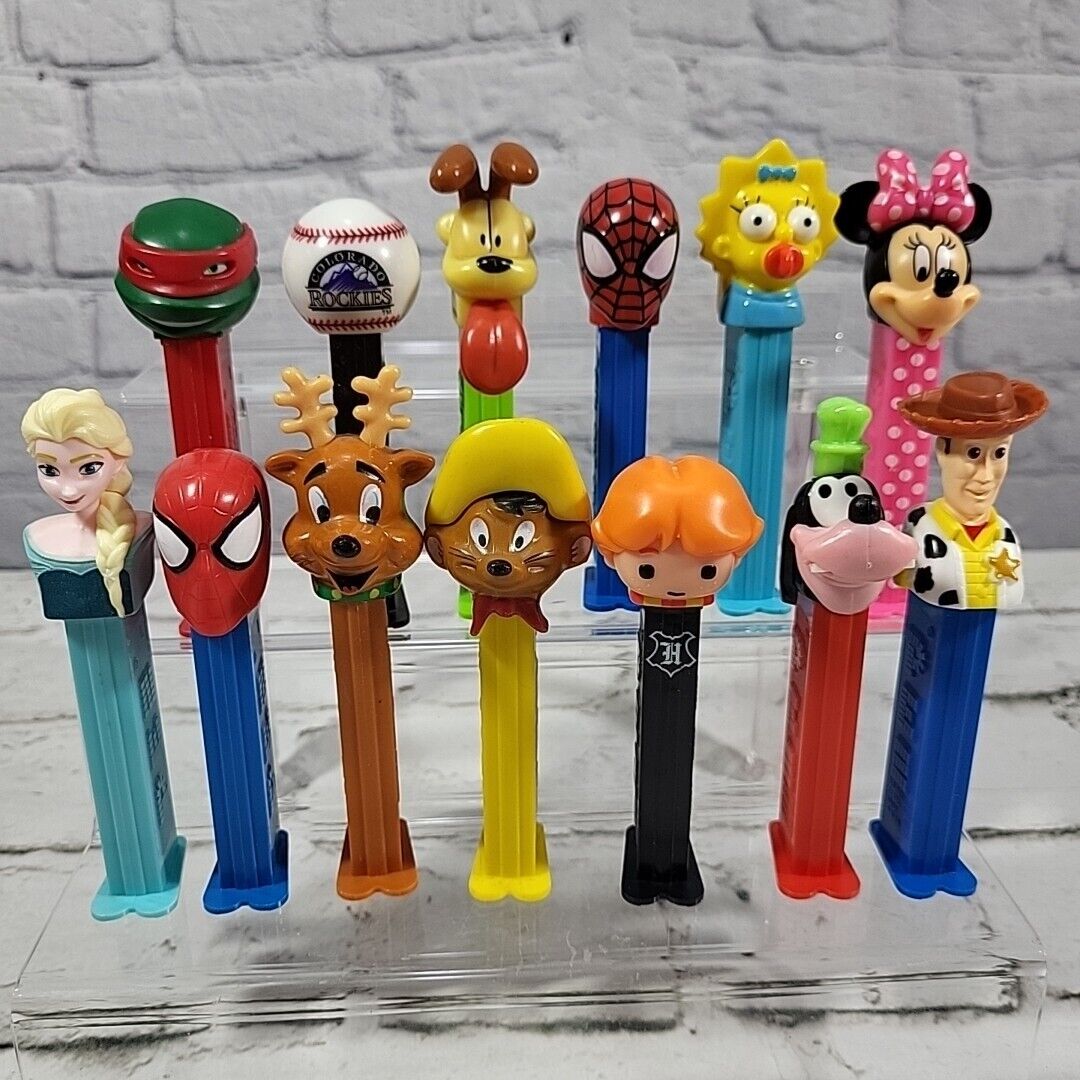 PEZ Classic Candy Dispensers Lot Of 13 Mixed Cartoon Characters Gonzalez Maggie 