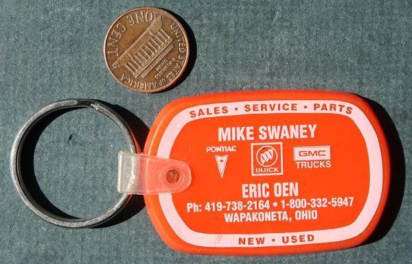1970-80s Wapakoneta Ohio Swaney Buick Pontiac Cars & GMC Truck ORANGE keychain--