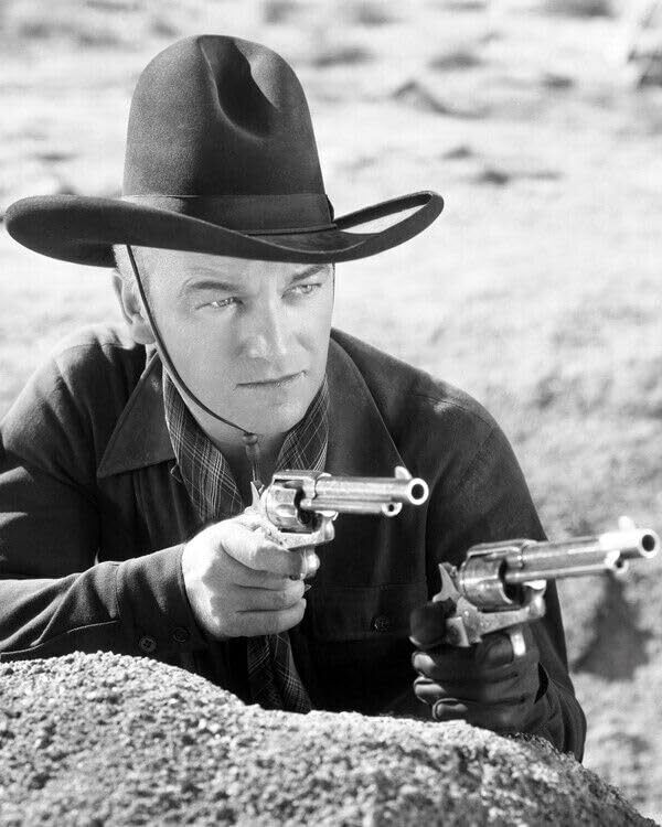 William Boyd as Hopalong Cassidy aims two pistols 24x36 inch Poster