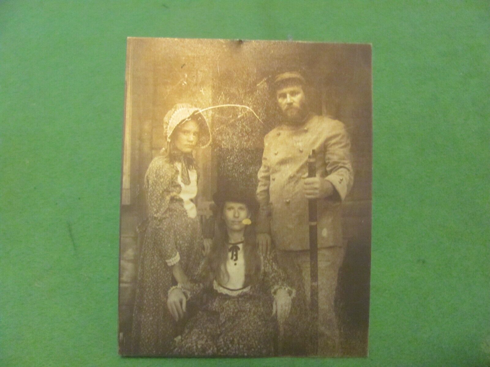 Antique Family Tin Type Photo with Military Man Holding Firearm. 5\