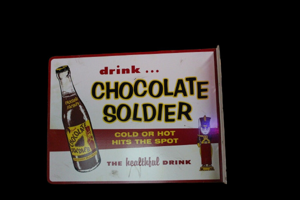 PORCELIAN CHOCOLATE SOLDIER ENAMEL SIGN SIZE 18X22 INCHES 2 SIDED WITH FLANGE