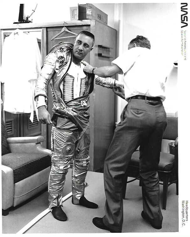 Gus Grissom getting dressed in his space suit in Washington