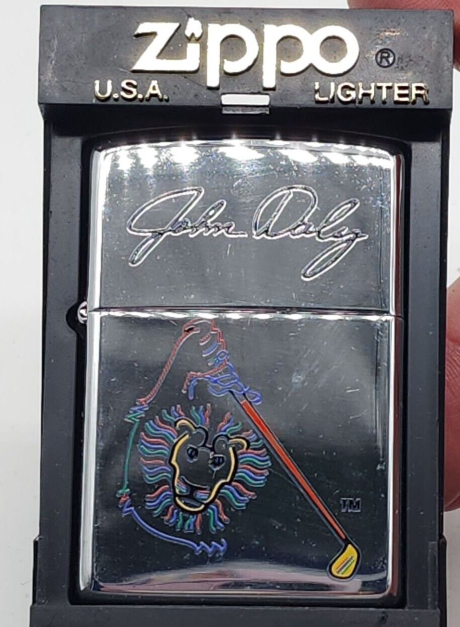 John Daly 'LION' PGA Golf Champion- 2000 Zippo - New in box - Sticker on back