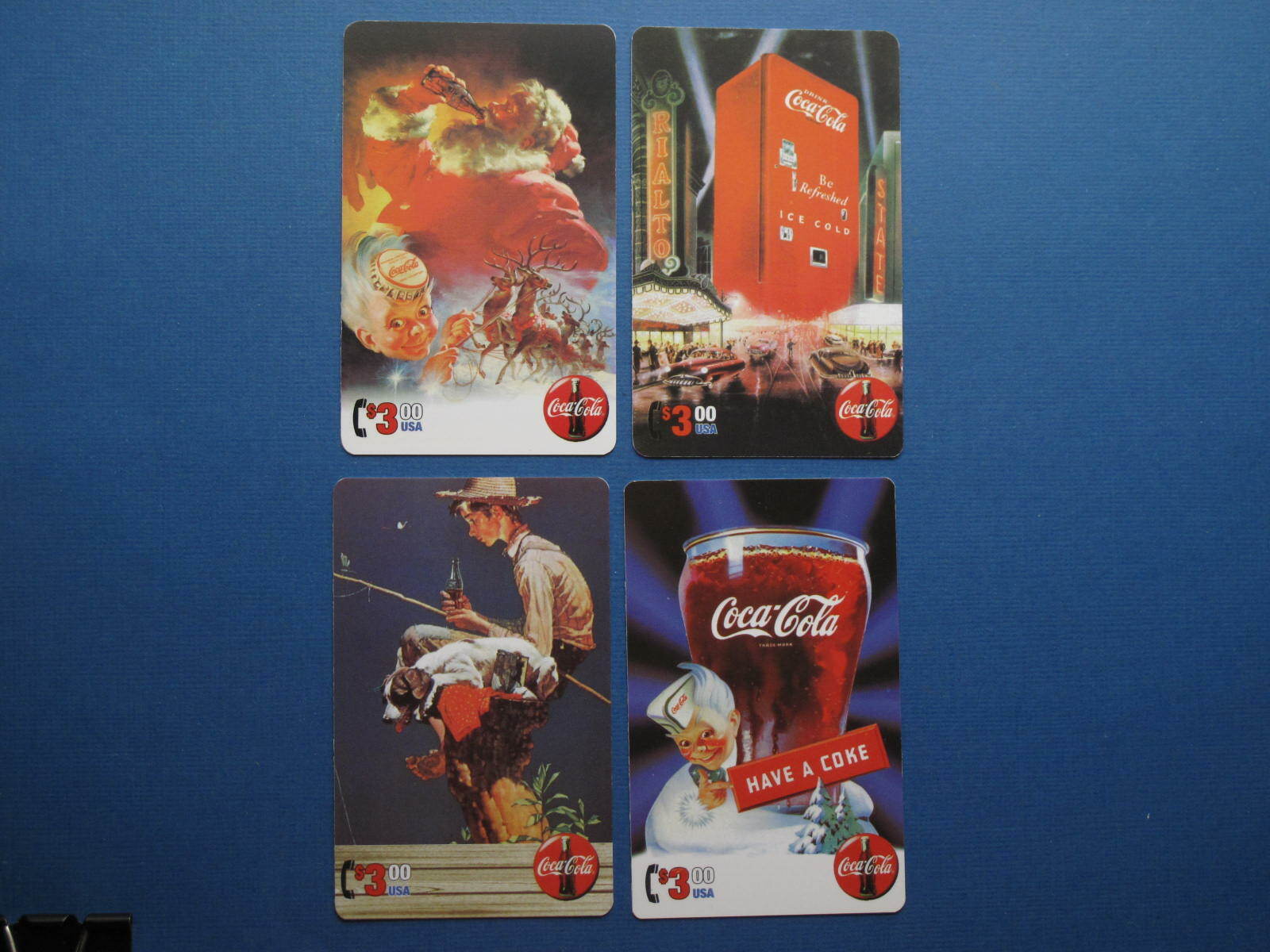 1995 Coca-Cola Phonecards Sundblom Santa Norman Rockwell  Collect-a-Card  4pcs 