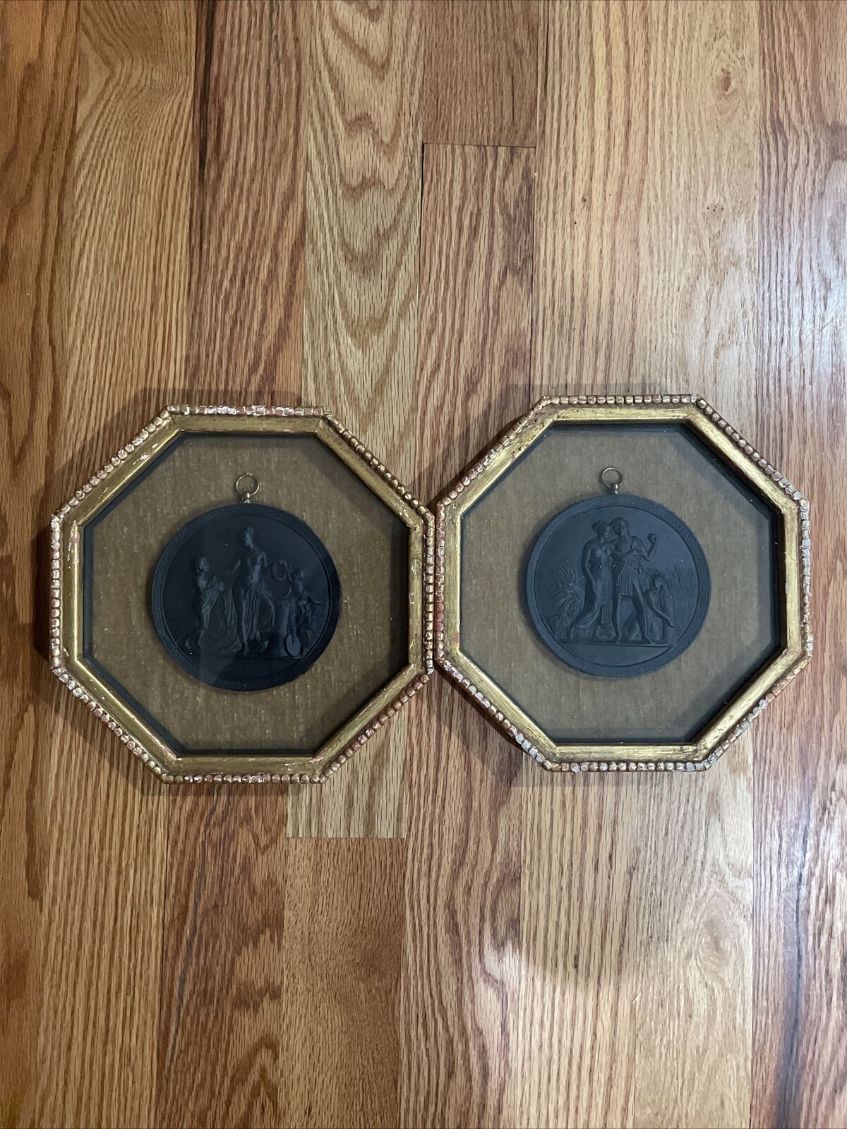 Vintage Black basalt framed medallions Pair