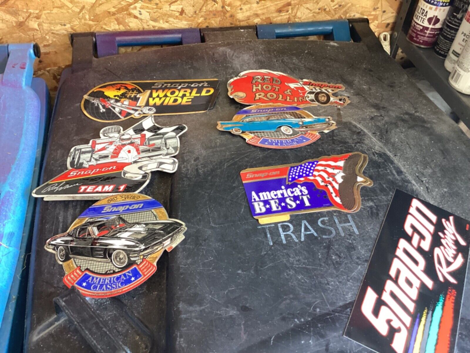 7 vintage snap on stickers. racing and cars nice. lot