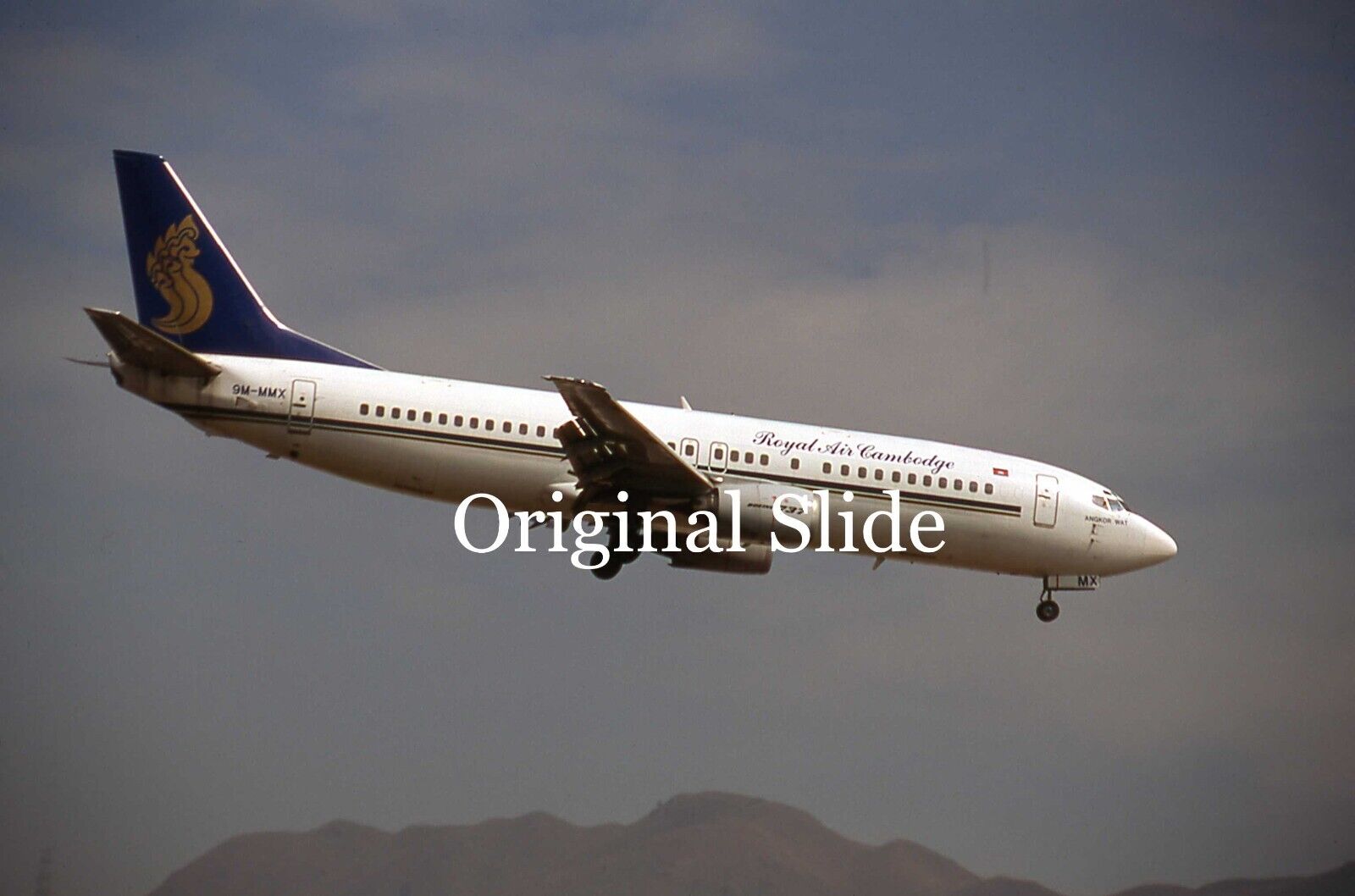 Aircraft Slide - Royal Air Cambodge B.737-400 9M-MMX @ HONG KONG 1995  (B166)