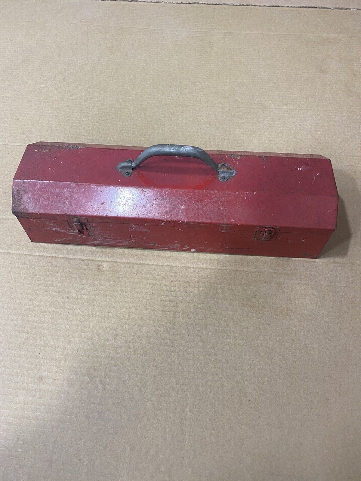 VINTAGE RED CAMBER  TOP STEEL TOOL BOX WITH TRAY.
