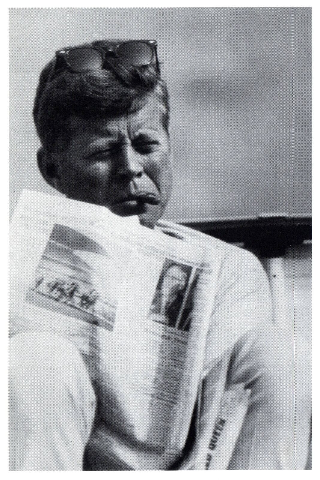 CONTINENTAL SIZE POSTCARD REPRODUCTION OF JOHN F. KENNEDY READING c. 1960