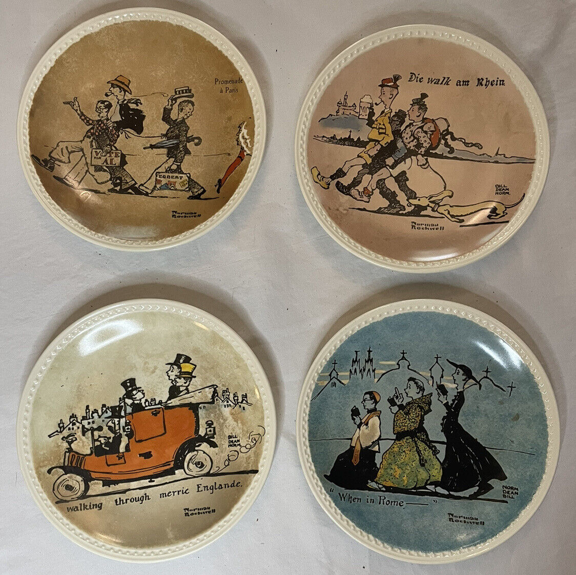 - Norman Rockwell 1927 set of 4 collector pottery plates \'\'Rockwell on Tour\'\' 