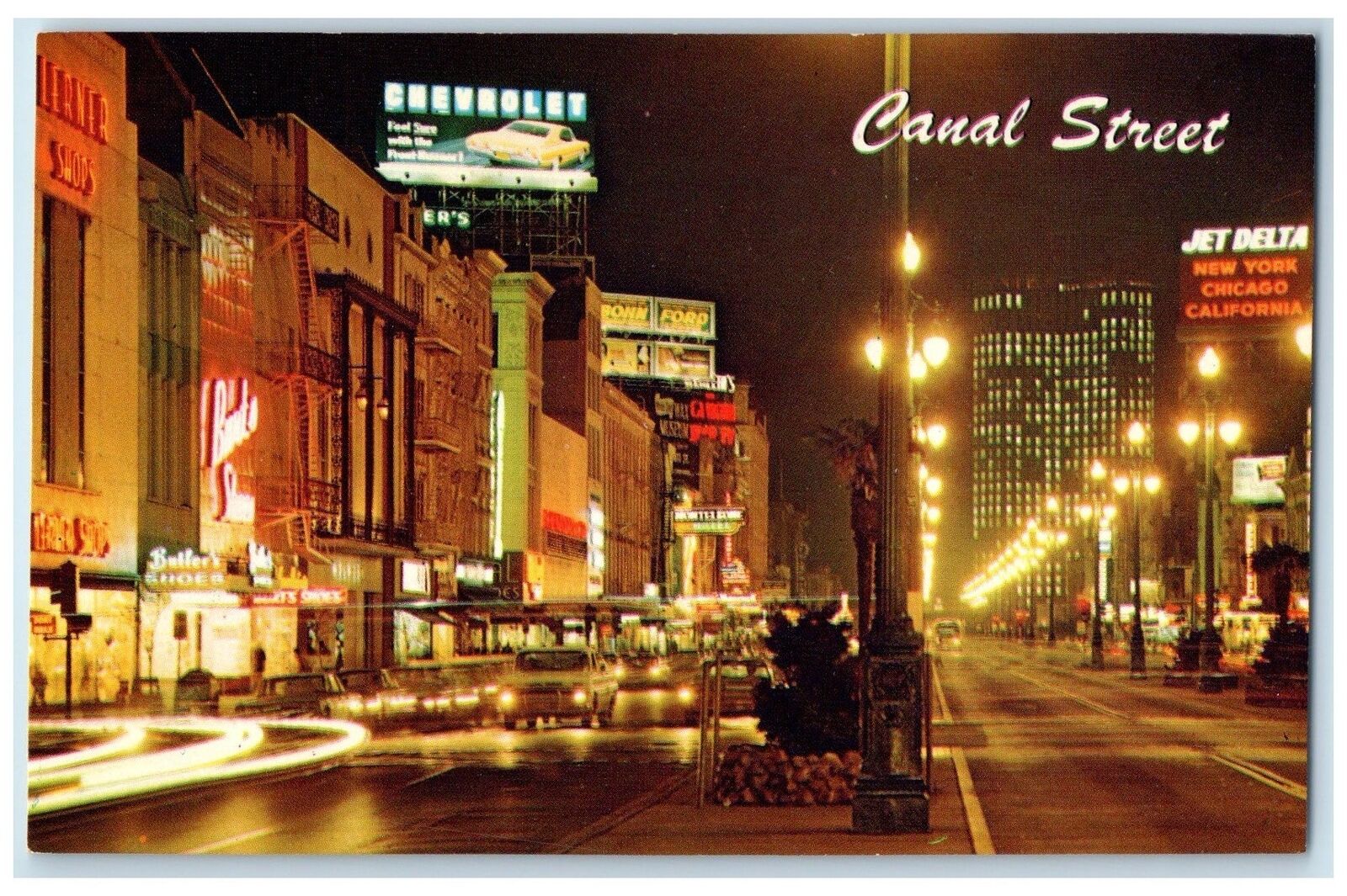 c1960's World-Famous Canal Street At Night Scene New Orleans Louisiana Postcard