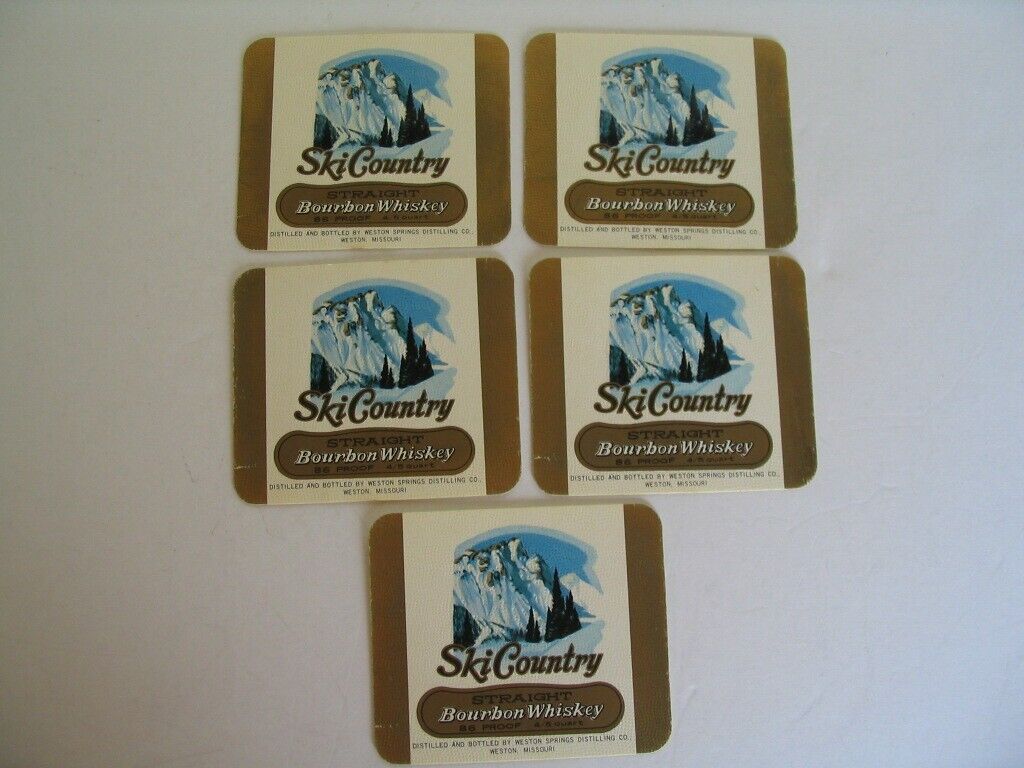 FIVE VINTAGE SKI COUNTRY 4/5th\'s large size square distillery decanter labels