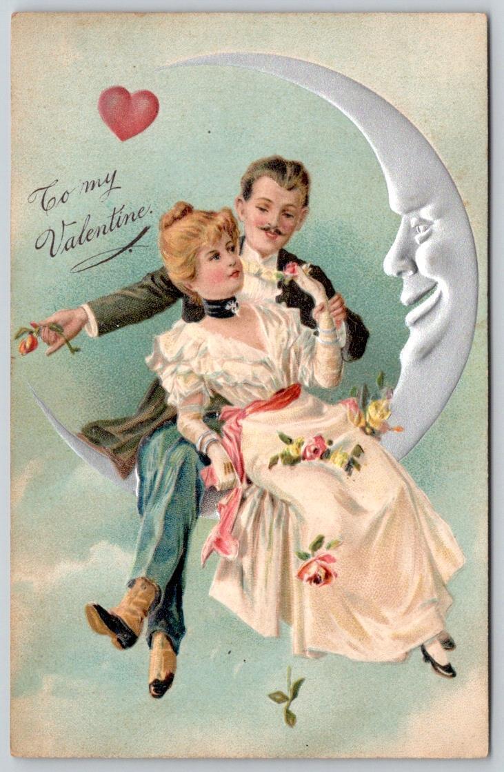 1910 VALENTINE SILVER CRESCENT MAN IN THE MOON ROMANTIC COUPLE EMBOSSED POSTCARD