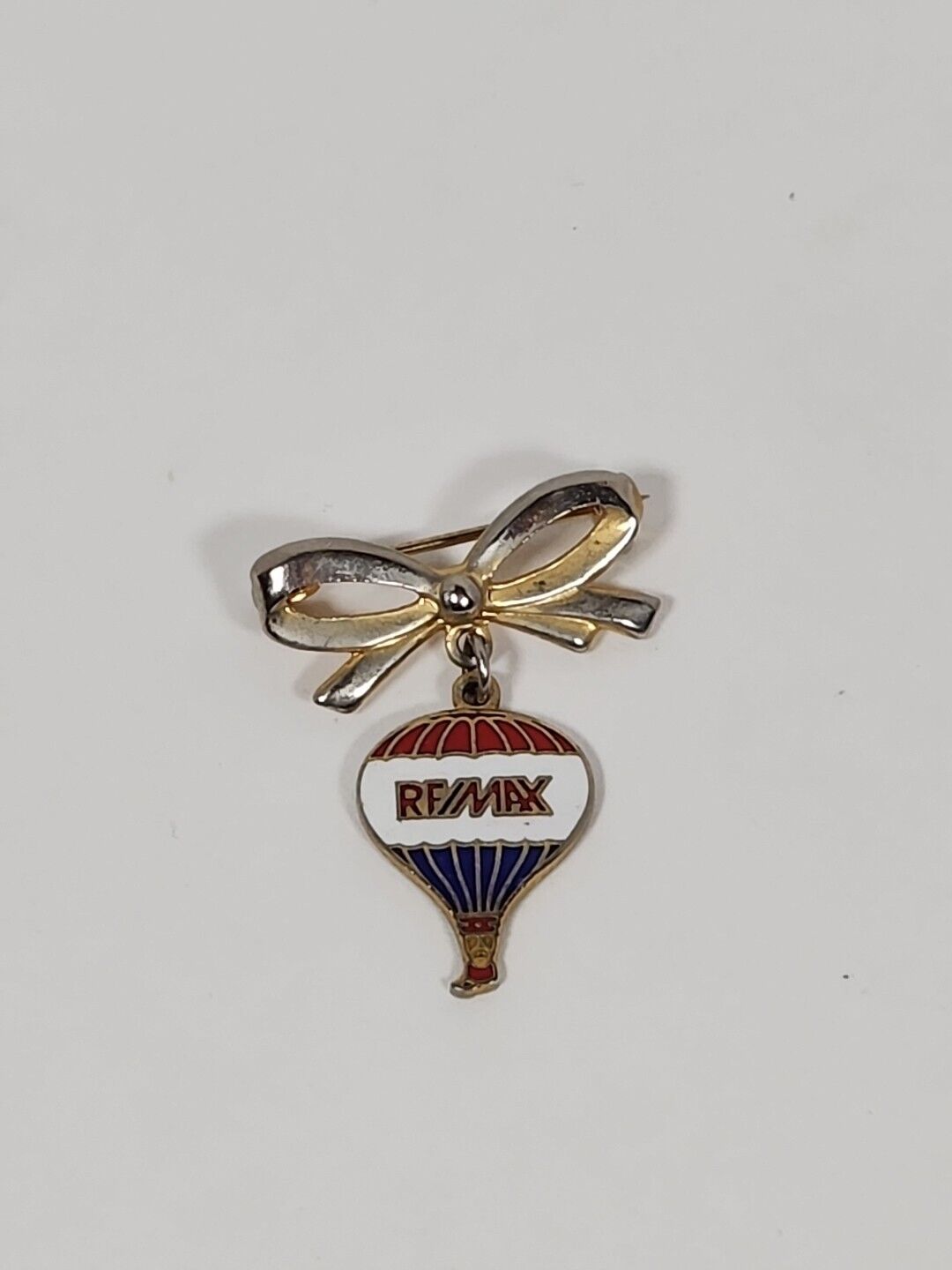 Remax Lapel Hat Pin Balloon Hanging From A Ribbon 