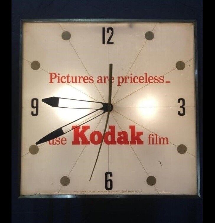 VINTAGE  KODAK FILM WALL CLOCK GREAT SHAPE WORKING CONDITION VERY RARE