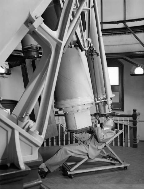 Royal Astronomer, Dr Harold Spencer Jones looking through a giant - 1930s Photo