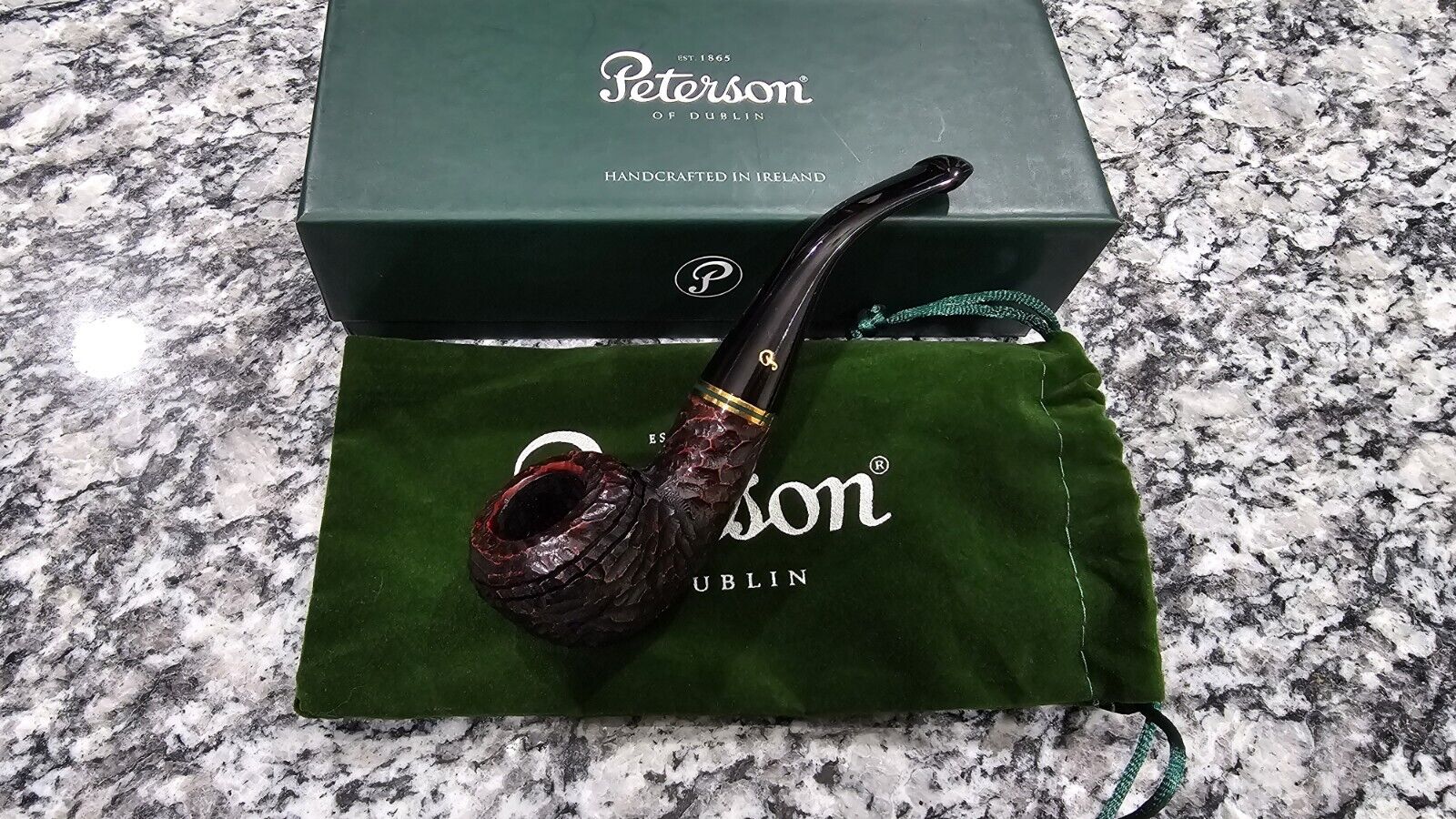 Peterson Emerald Rusticated Bent Rhodesian (999) P-Lip Tobacco Pipe - New