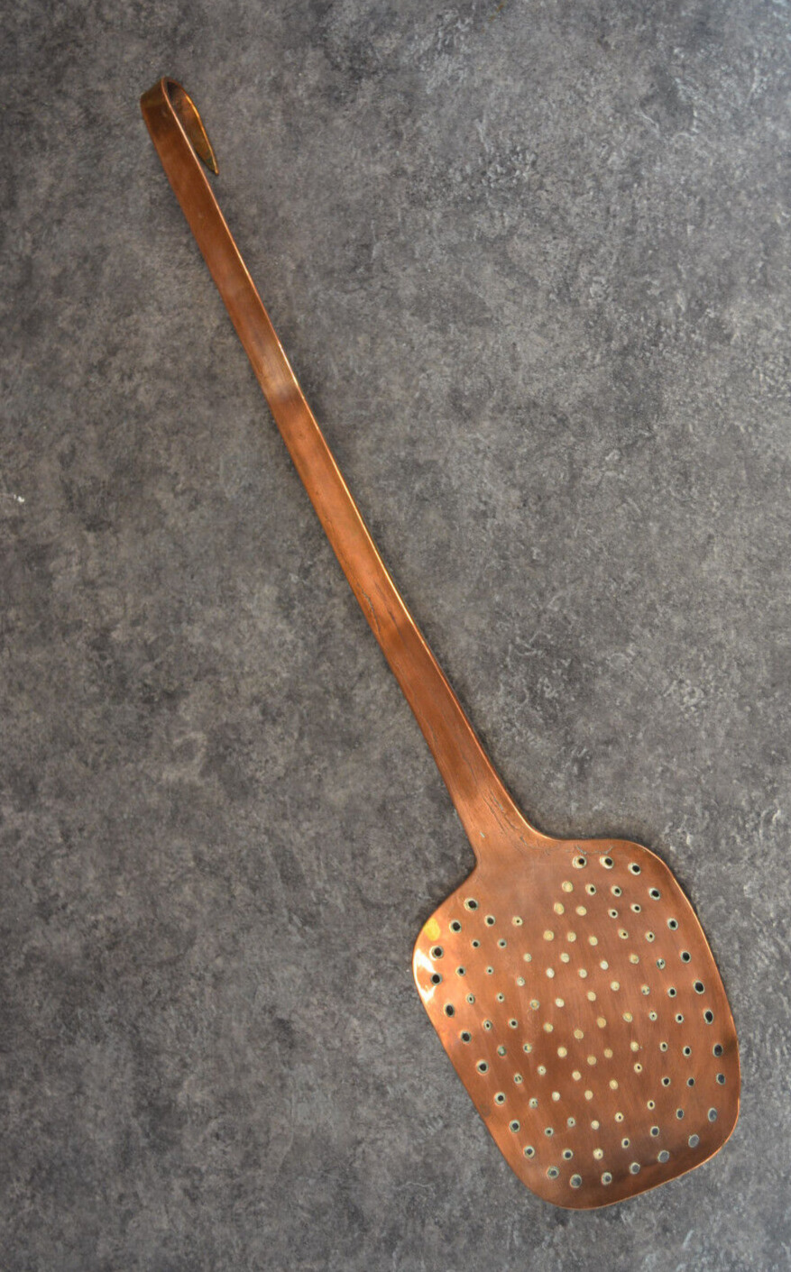 Antique and massive French copper hand held strainer