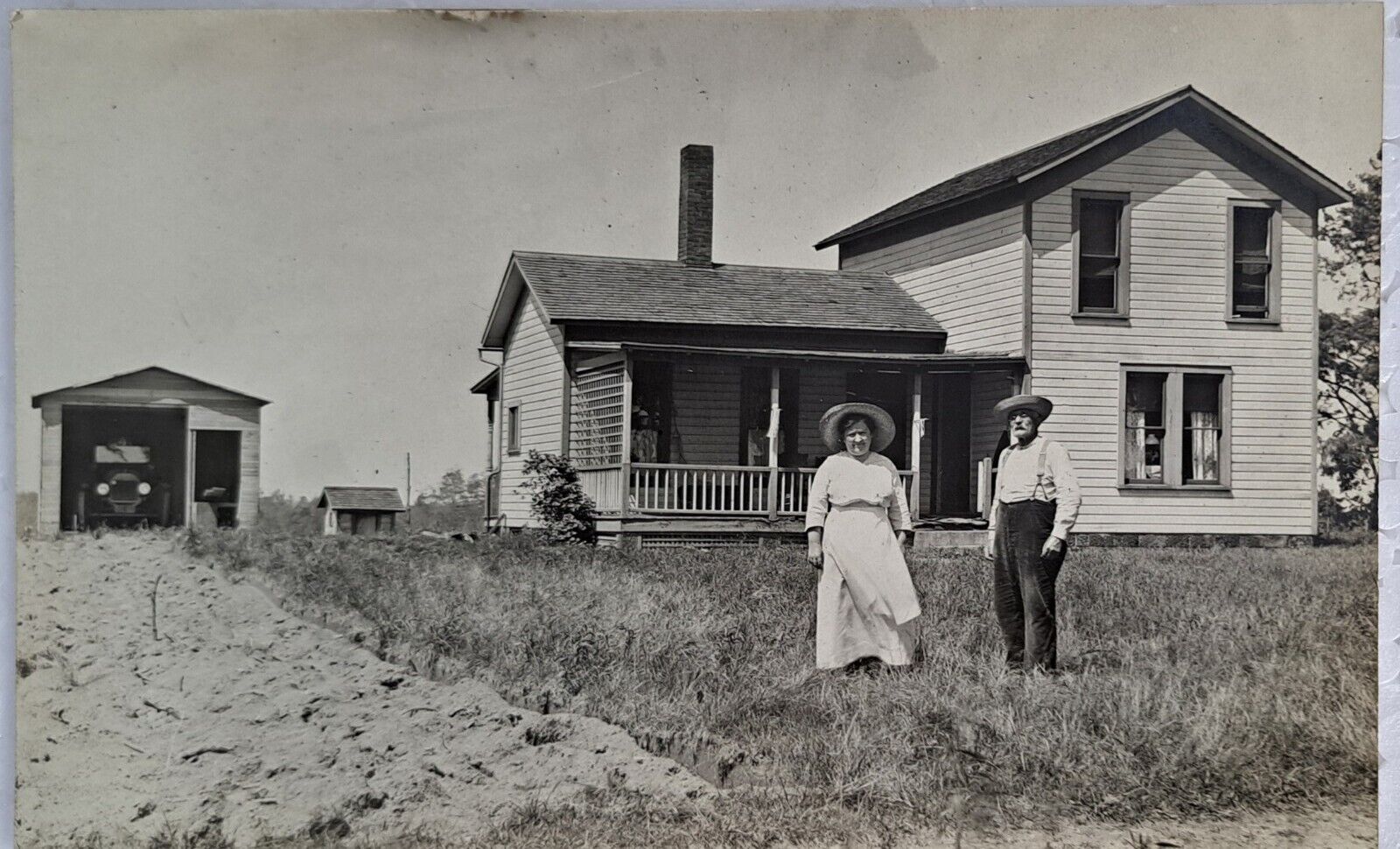 Early 1900\'s ? RPPC Real Photo Postcard Unposted Couple in Front Of Their House