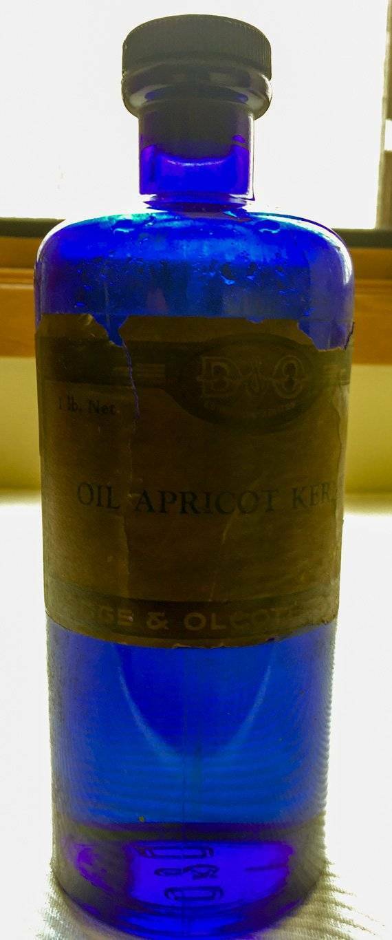 Vintage Beautiful Apricot Kernel Oil Blue Bottle Dodge Olcott with Oil