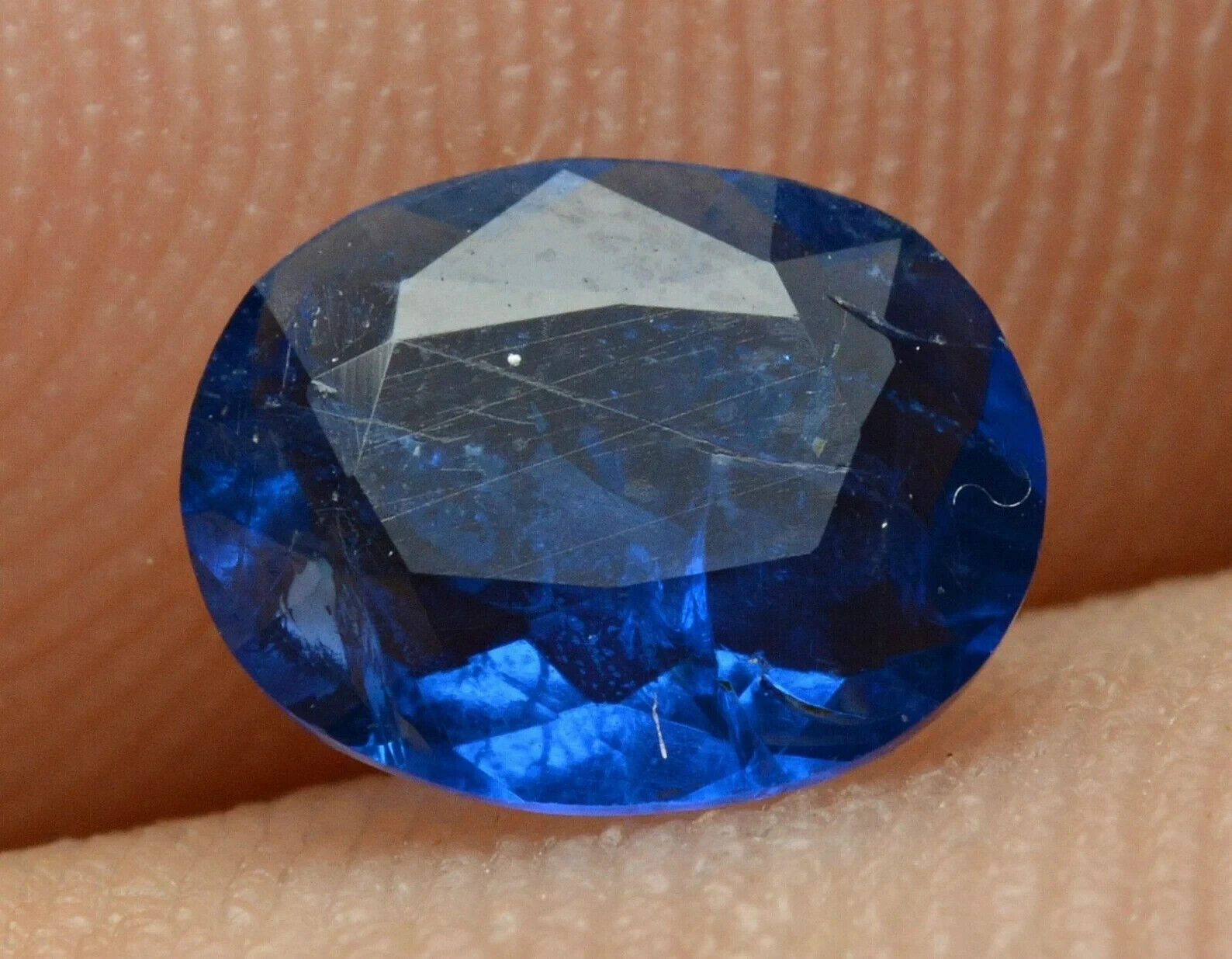 Rare 0.55 Carat Fluorescent Top Quality Transparent Faceted Afghanite Gemstone
