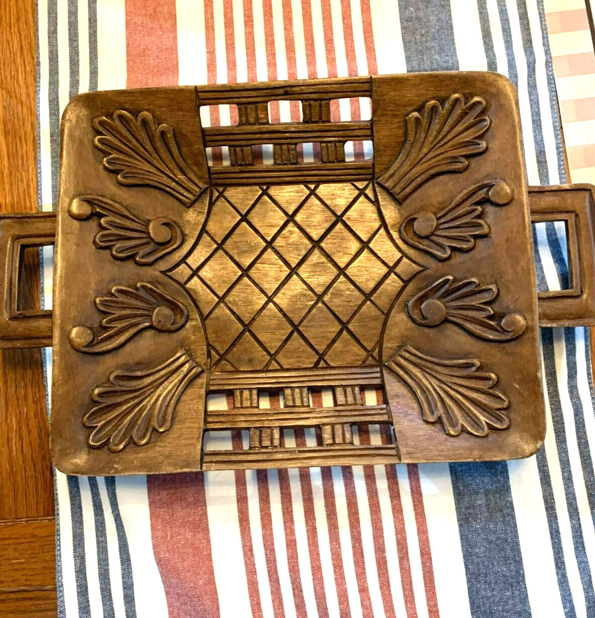 Wooden carved tray 15 X 9.5 inches, very unique. Versatile and a good size.