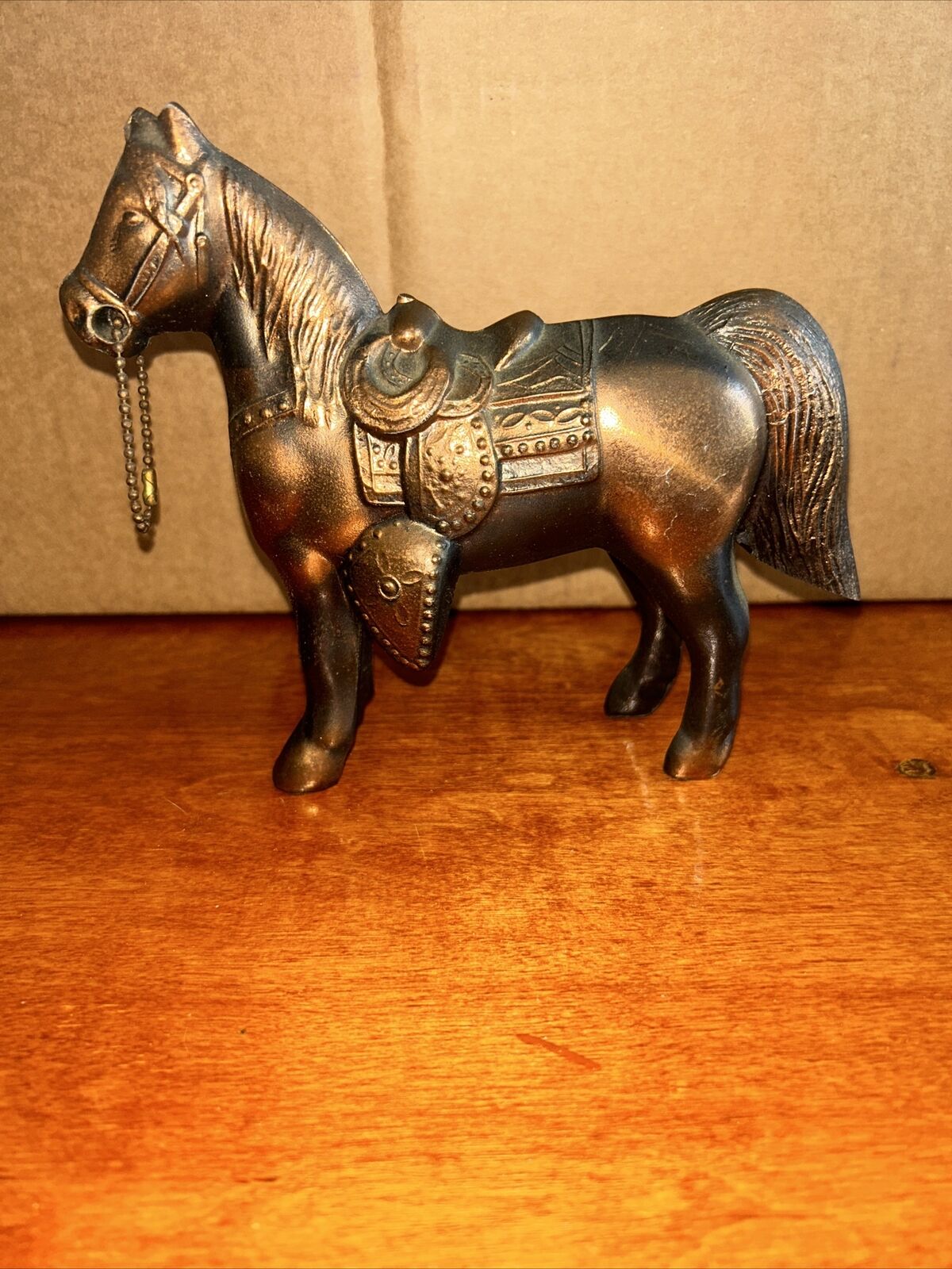 Vintage (1960\'s) Bronze Metal Carnival Prize Vintage Horse with Saddle and chain