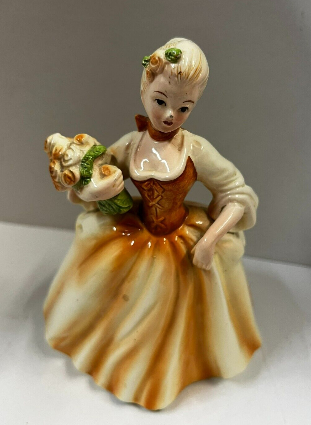 Vintage Inarco E-2087 Lady Holding Flowers Orange Dress Planter Figurine 7.5\