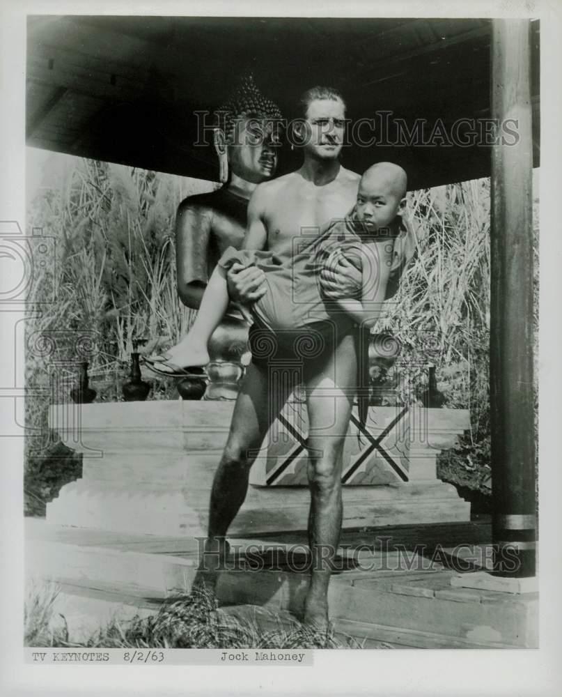 1963 Press Photo Actor Jock Mahoney Holding Child at Shrine - kfx29251