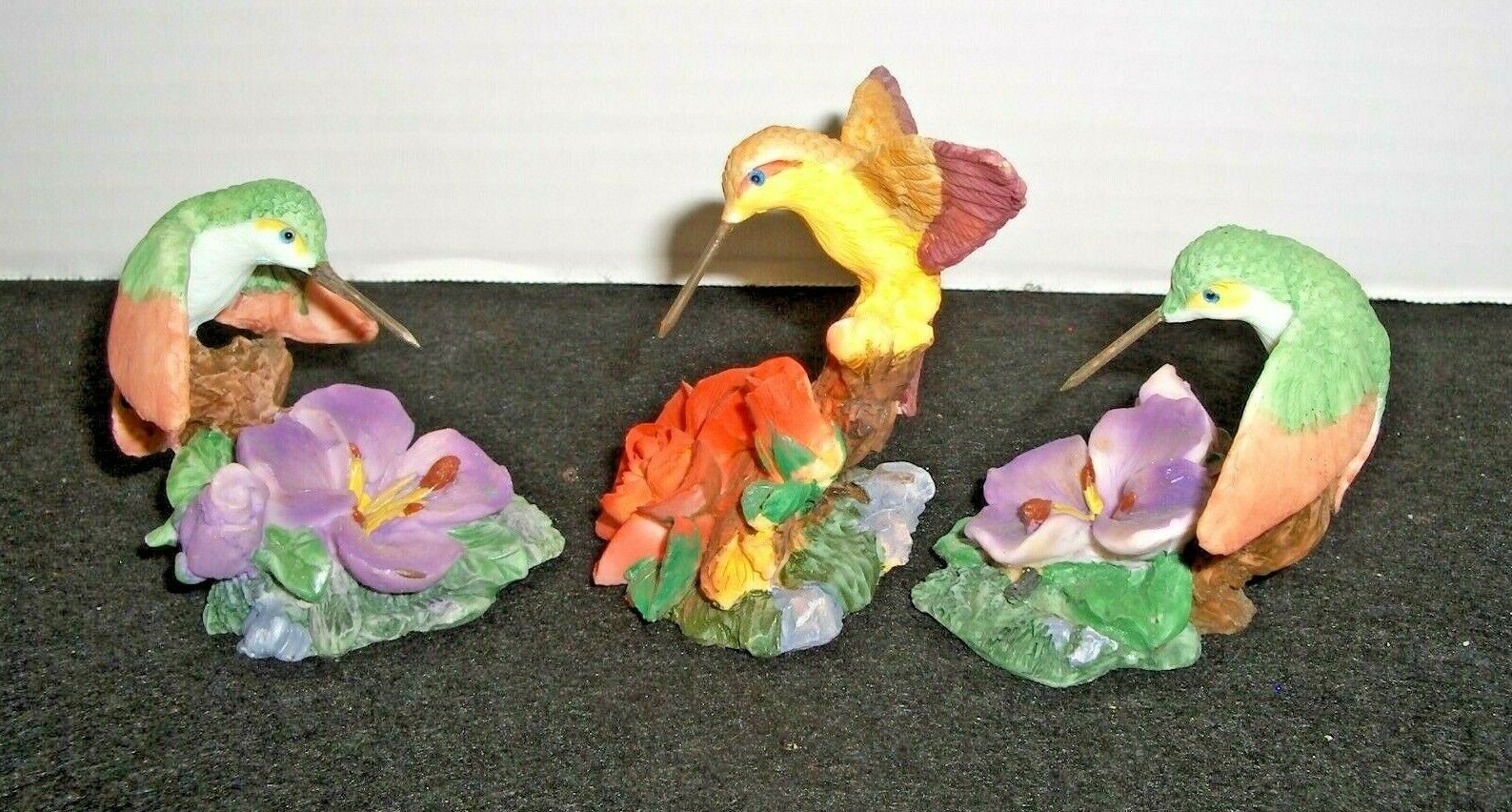 3 Pc. HUMMINGBIRD FIGURINES WITH FLORAL MADE OF POLYRESIN.